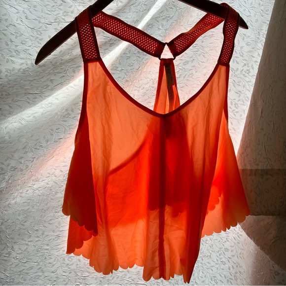 Free People Movement Pretty Lil Running Top in Neon Mango. - Picture 6 of 15